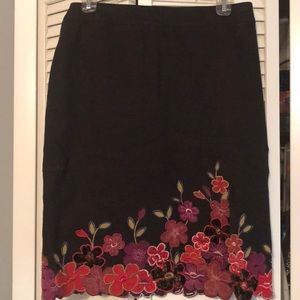 Black skirt with flower trim, size 6